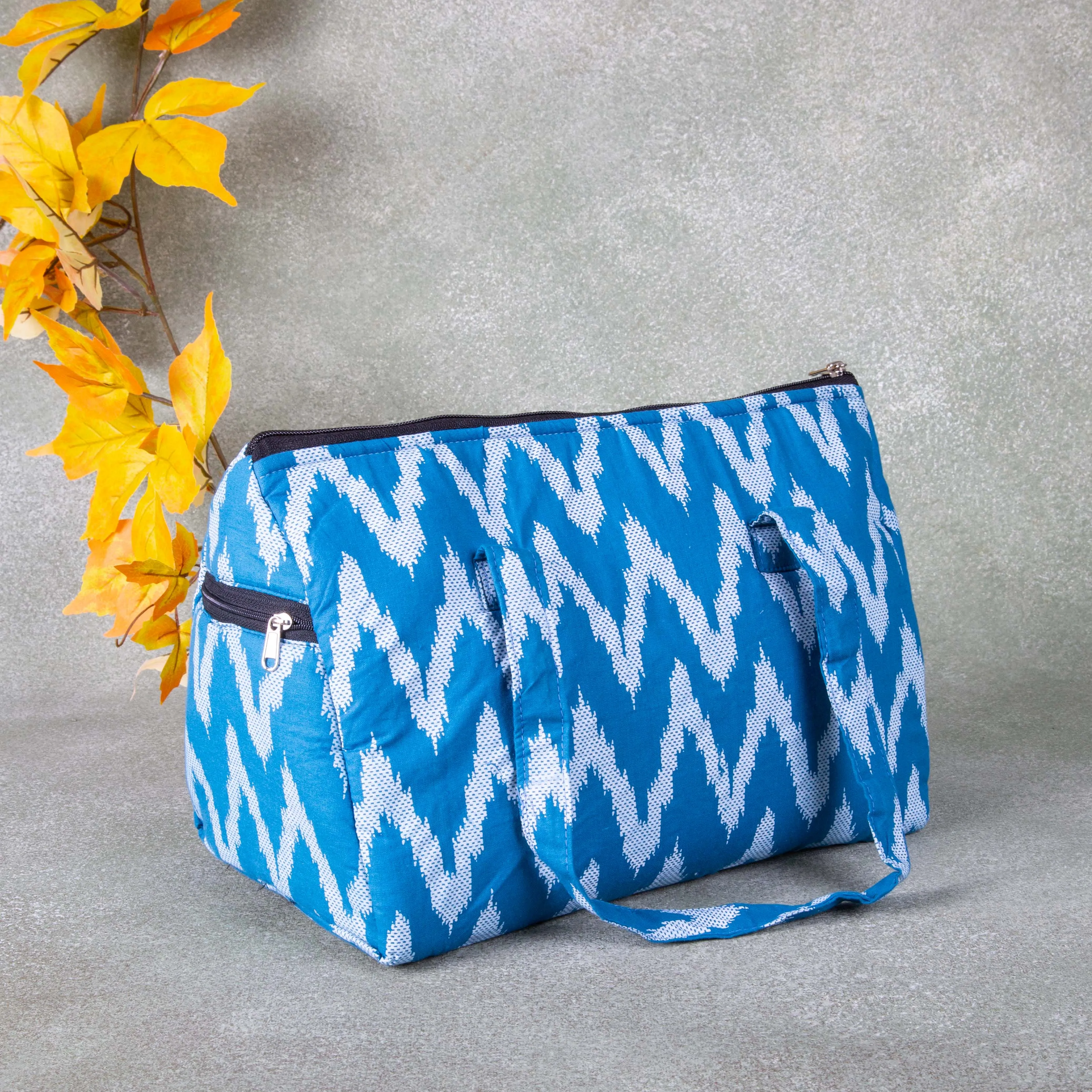 Barrel Handbags Blue colour with zig zag Design.